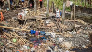 Aldrin Veruela, 25, of the Philippines, poses for a photo Nov. 18, 2020, after losing his house to flash floods caused by Typhoon Goni. (CNS photo/Jomari Guillermo, Catholic Relief Services)