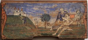 Imagen destacada: Pintura del Buen Samaritano del Museo Municipal de Apicultura de Radovljica, Eslovenia. (WikiMedia Commons).