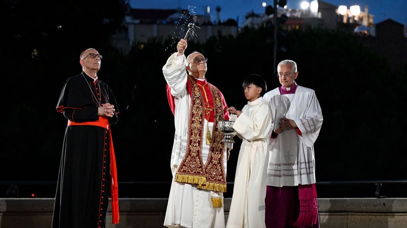 Pope Leo XIV sprinkles holy water during the blessing and inauguration of the Tower of Jesus Christ after celebrating Mass at the Basilica of the Sagrada Familia in Barcelona, June 10, 2026, during his June 6-12 apostolic journey to Spain. (OSV News photo/Vatican News)